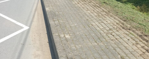 Oczyszczanie chodnika Buszkowice Małe 1275D